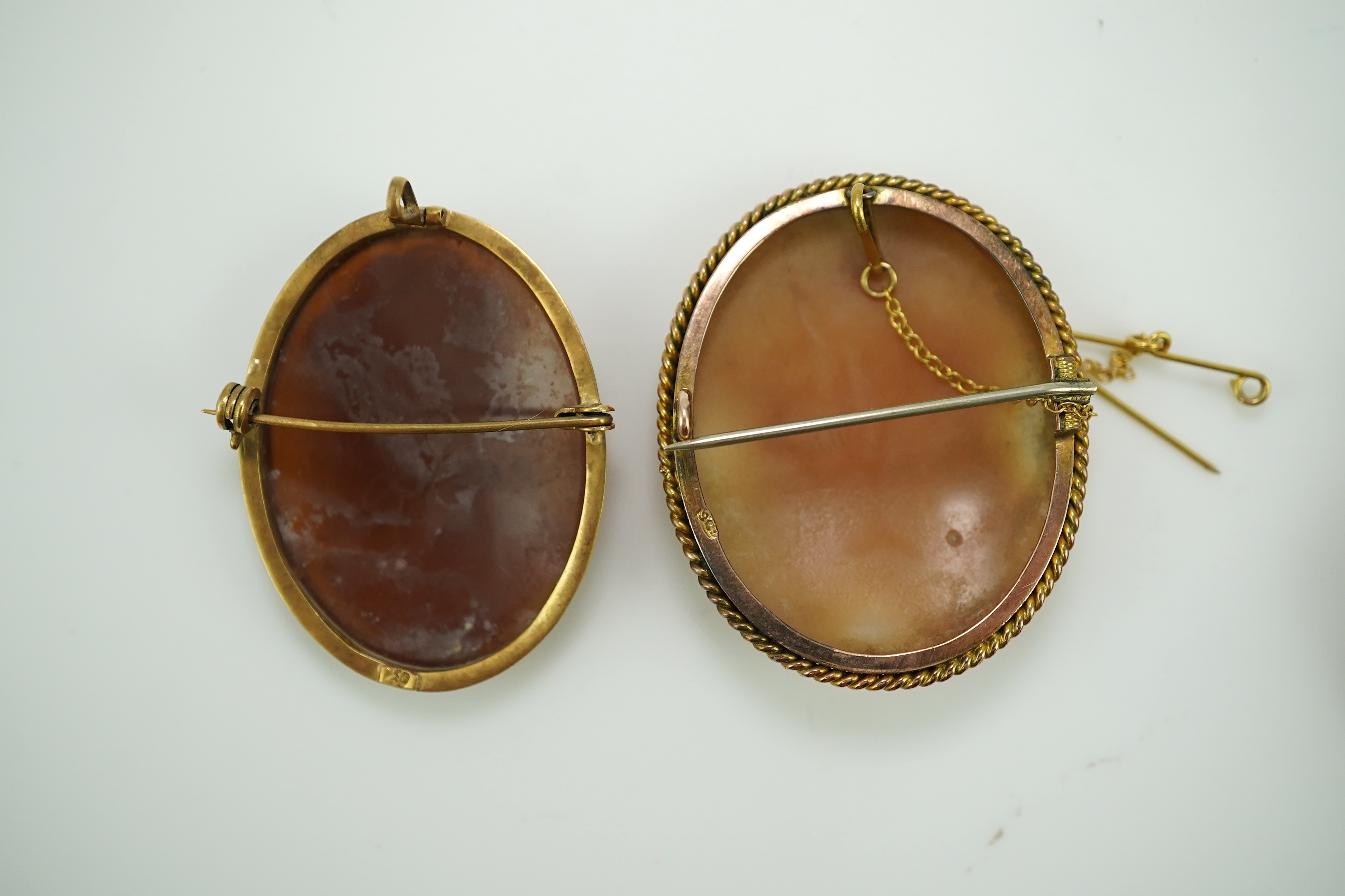 Three shell cameo brooches, 20th century